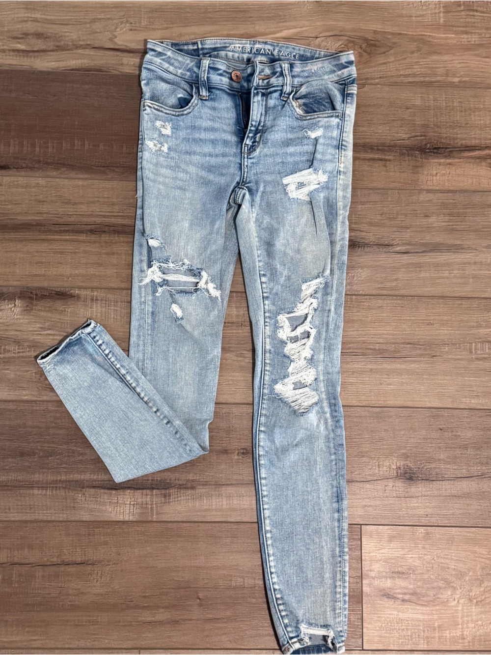 American Eagle Outfitters Mid Rise Light Blue Denim Jeans with Brown Stitching